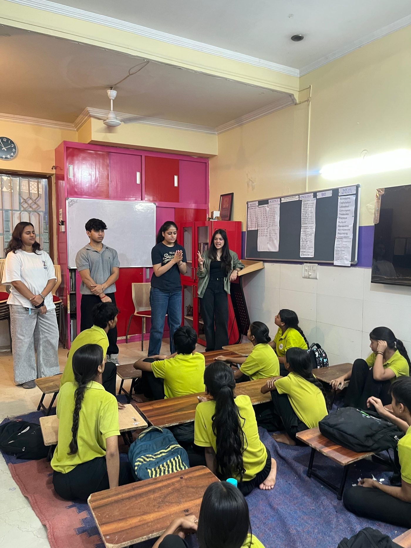 A school outreach session with younger students